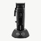 Color: Black; Black metal Saber 2 digital brushless clipper in charging base