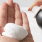 SexyHair Style Curl Power Curl Bounce Mousse — mousse being dispensed from the can into a hand