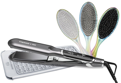 Olivia Garden Flat Iron — black and silver Titanium + Ion flat iron showing 455 on its display, resting on a silver dotted heat-resistant mat, with three iridescent oval Olivia Garden brushes fanned behind it, plain white background