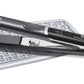 Olivia Garden Titanium + Ion Flat Iron 1 in — black straightener with brushed silver titanium plates and a digital temperature display, TA-FL1, shown closed in profile on a plain white background