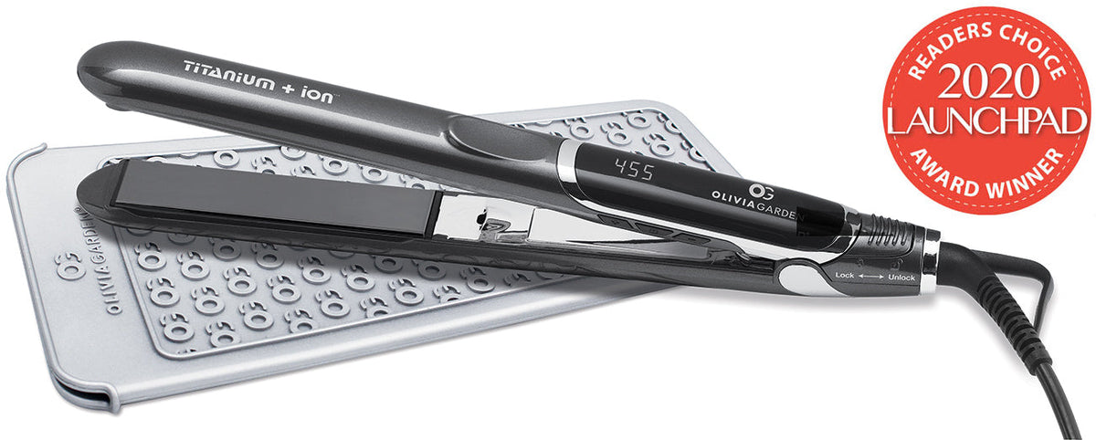 Olivia Garden Titanium + Ion Flat Iron 1 in — black straightener with brushed silver titanium plates and a digital temperature display, TA-FL1, shown closed in profile on a plain white background