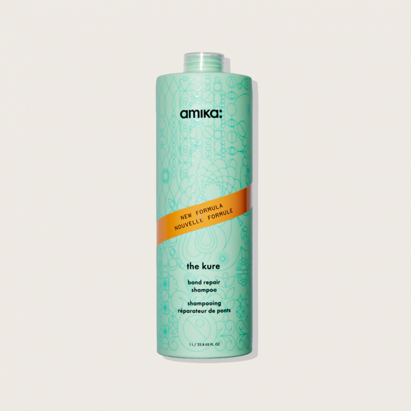 Amika - The Kure - Champú reparador |33.8oz| 